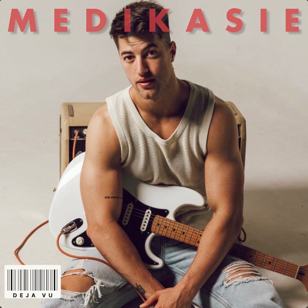 Medikasie single cover, the artist with a white electric guitar